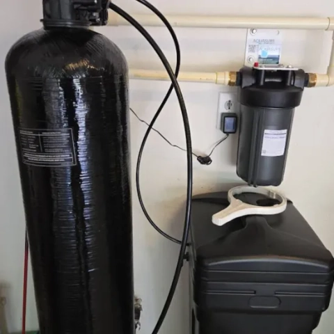 Formula Plumbing residential water softener installation with a high-efficiency digital control valve for scale control