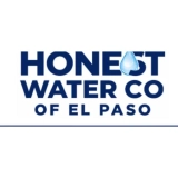 Plumber from Honest Water Co of El Paso connecting piping to a home water conditioning unit