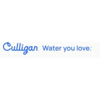 Commercial Culligan Water office facility with glass double-door entrance and manicured bushes